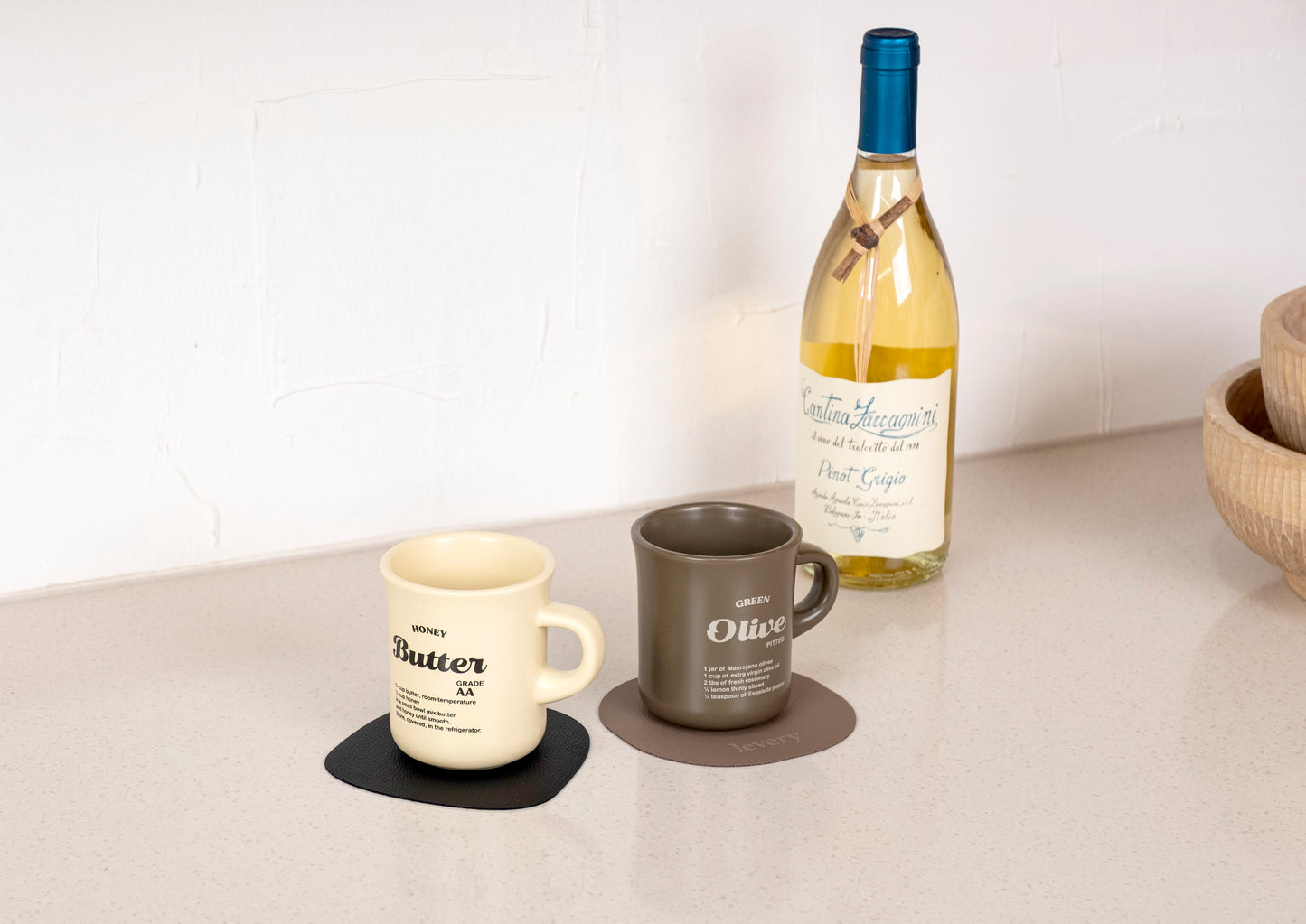 Pacific coaster in Roskin vegan leather with a cup resting on it
