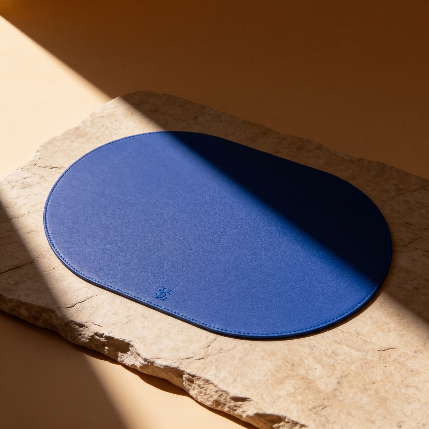 Cobalt Victoria hard table mat in Roskin vegan leather
